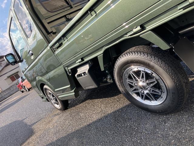 スーパーキャリイ X 5型 届出済未使用車・禁煙車・ 4AT パートタイム4WD スズキセーフティサポート クルーカーキーパールM 社外アルミホイール フロントフラップスポイラーエアロ・サイドステップエアロ クリアランスソナー パワーウィンドウ(61枚目)