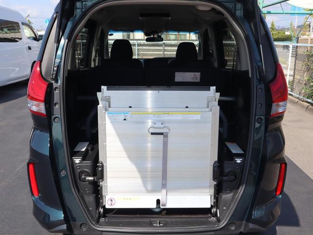 フリード＋ハイブリッド ハイブリッドＧ車いすスロープ車　フリップダウンモニター付き　車いすスロープ車　ＡＢＳ　エアバッグ　スマートキー＆プッシュスタート　衝突被害軽減　左右電スラ　ナビ・テレビ　バックカメラ　フリップダウンモニター（後席モニター）ＥＴＣ　ドラレコ　ウィンチリモコン（4枚目）