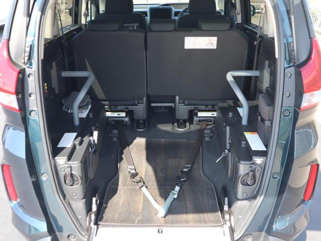 フリード＋ハイブリッド ハイブリッドＧ車いすスロープ車　フリップダウンモニター付き　車いすスロープ車　ＡＢＳ　エアバッグ　スマートキー＆プッシュスタート　衝突被害軽減　左右電スラ　ナビ・テレビ　バックカメラ　フリップダウンモニター（後席モニター）ＥＴＣ　ドラレコ　ウィンチリモコン（6枚目）
