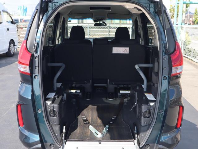 フリード＋ハイブリッド ハイブリッドＧ車いすスロープ車　フリップダウンモニター付き　車いすスロープ車　ＡＢＳ　エアバッグ　スマートキー＆プッシュスタート　衝突被害軽減　左右電スラ　ナビ・テレビ　バックカメラ　フリップダウンモニター（後席モニター）ＥＴＣ　ドラレコ　ウィンチリモコン（10枚目）