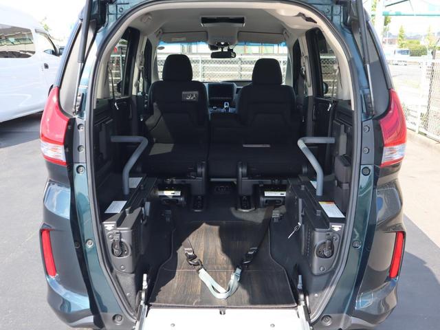 フリード＋ハイブリッド ハイブリッドＧ車いすスロープ車　フリップダウンモニター付き　車いすスロープ車　ＡＢＳ　エアバッグ　スマートキー＆プッシュスタート　衝突被害軽減　左右電スラ　ナビ・テレビ　バックカメラ　フリップダウンモニター（後席モニター）ＥＴＣ　ドラレコ　ウィンチリモコン（11枚目）
