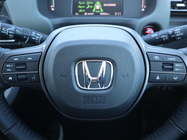 フリード ｅ：ＨＥＶ　クロスター　　車いすスロープ車　衝突被害軽減ブレーキ、左右電動スライドドア、ソナー、ブラインドスポットワーニング、アダプティブクルーズコントロール、オートエアコン、リヤクーラー、シートヒーター、ＬＥＤライト、フォグランプ、ＡＷ（21枚目）