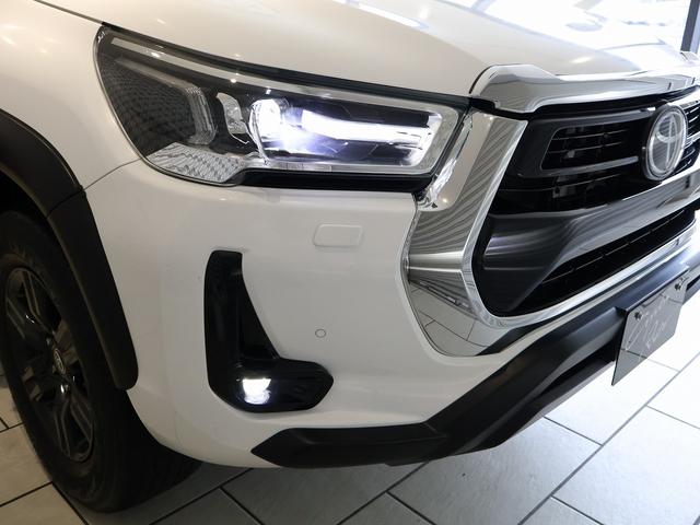 ハイラックス Ｚ　オーバーフェンダー　ＴＲＤスポーツバー　ベッドライナー　革調シートカバー　ＴＯＹＯＴＡデカール　ＬＥＤヘッドライト　純正ＳＤナビＴＶ　バックモニター　クリアランスソナー　寒冷地仕様　純正アルミ　４ＷＤ（33枚目）