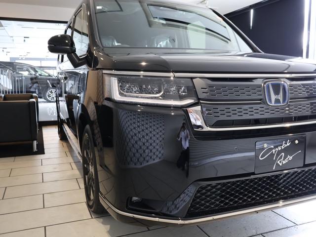 ステップワゴン e:HEVスパーダ 登録済未使用車 純正11.4型ナビTV マルチビューカメラシステム 両側パワースライドドア パワーバックドア LEDヘッドライト ブラインドスポットモニター ハーフレザーシート 純正アルミ 7人乗り(27枚目)