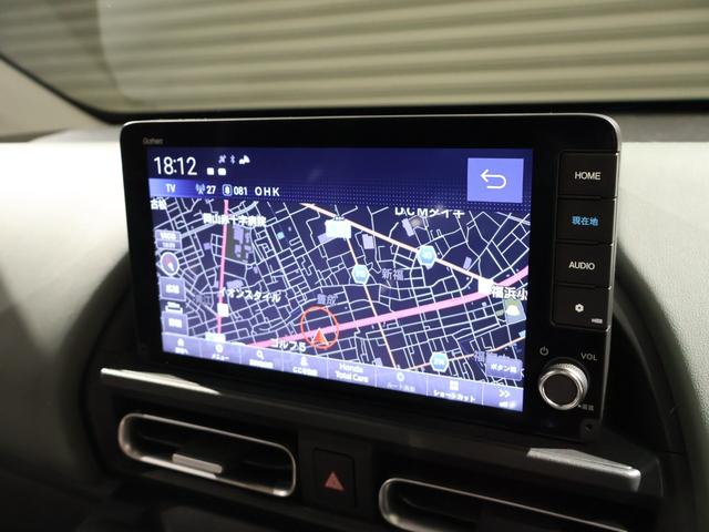 フリード ｅ：ＨＥＶクロスター　登録済未使用車　純正９型ナビＴＶ　マルチビューカメラシステム　両側パワースライドドア　ＬＥＤヘッドライト　ハーフレザーシート　シートヒーター　ブラインドスポットモニター　専用純正アルミ　６人乗り（4枚目）