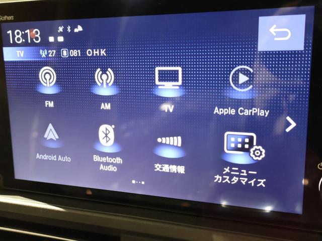 フリード ｅ：ＨＥＶクロスター　登録済未使用車　純正９型ナビＴＶ　マルチビューカメラシステム　両側パワースライドドア　ＬＥＤヘッドライト　ハーフレザーシート　シートヒーター　ブラインドスポットモニター　専用純正アルミ　６人乗り（7枚目）