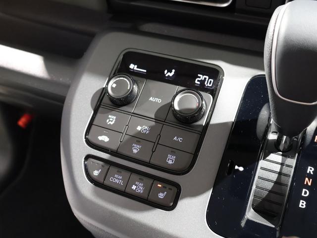 フリード ｅ：ＨＥＶクロスター　登録済未使用車　純正９型ナビＴＶ　マルチビューカメラシステム　両側パワースライドドア　ＬＥＤヘッドライト　ハーフレザーシート　シートヒーター　ブラインドスポットモニター　専用純正アルミ　６人乗り（10枚目）