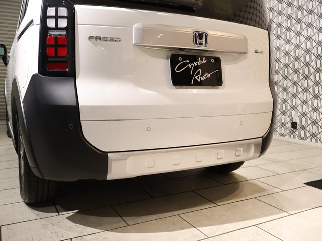 フリード ｅ：ＨＥＶクロスター　登録済未使用車　純正９型ナビＴＶ　マルチビューカメラシステム　両側パワースライドドア　ＬＥＤヘッドライト　ハーフレザーシート　シートヒーター　ブラインドスポットモニター　専用純正アルミ　６人乗り（39枚目）