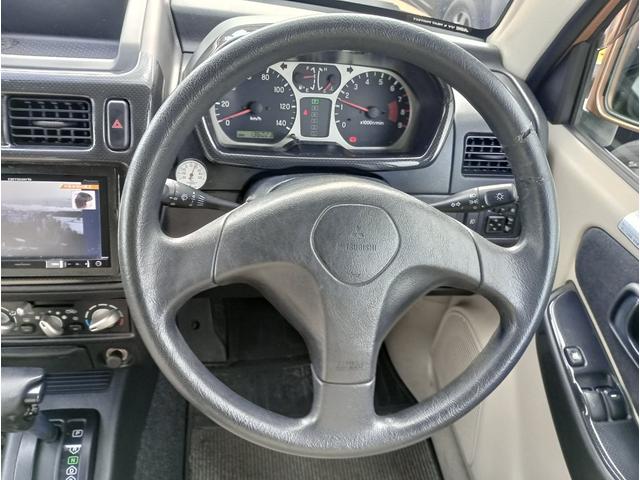 パジェロミニ ブルームエディションＶＲ　４ＷＤ／純正１５インチホイール／バックカメラ／ｃａｒｒｏｚｚｅｒｉａＡＶＩＣ－ＲＺ３０１メモリーナビ（7枚目）