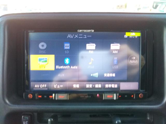 ハイゼットカーゴ クルーズ　ハイルーフ　メモリーナビ・フルセグ・ＣＤ／ＤＶＤ再生・Ｂｌｕｅｔｏｏｔｈ・バックカメラ・ＥＴＣ・キーレス・社外アルミ（9枚目）