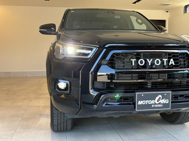 ハイラックス Ｚ　ＧＲスポーツ　ワンオーナー　折りたたみハードトノカバー　ベッドライナー　ＴＯＹＯＴＡデカール　純正８型ディスプレイオーディオ　ナビ　パノラミックビューモニター　フロント・リアドライブレコーダー　ブラックハーフレザーシート　パドルシフト　Ｇｏｏ鑑定車（12枚目）