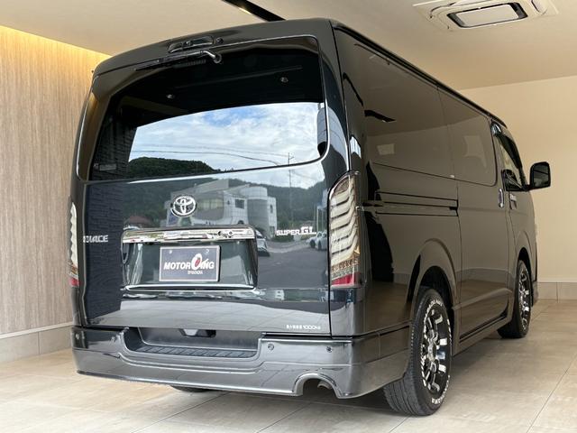 ハイエースバン スーパーGL ダークプライムII デジタルインナーミラー モデリスタLED付F・SRエアロ・マルチロールトランスポーター2 専用フロア・ベッドキット・補助バッテリー 純正SDナビ パノラミックビューモニター 両側パワースライドドア ETC2.0 Goo鑑定車(23枚目)