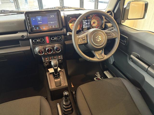 ジムニー ＸＣ　届出済未使用車　ブレーキサポート　アイドリングストップ　カロッツェリア９型ディスプレイオーディオ　バックモニター　ＨＤＭＩ・ＵＳＢ入力端子　ＥＴＣ　シートヒーター　リアパークセンサー　クルーズコントロール　ＬＥＤヘッドライト　背面タイヤ　純正１６ＡＷ（26枚目）