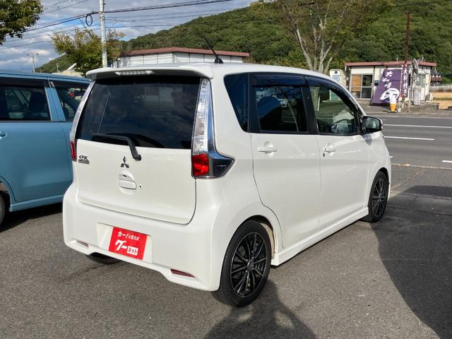 ｅＫカスタム Ｔ　ワンオーナー　禁煙車　フルセグＴＶ　バックカメラ　ミラー型バックモニター　ローダウン　オートライト　社外１５インチアルミホイール　ＣＤ／ＤＶＤ再生可　ＥＴＣ　スマートキー　プッシュスタート（2枚目）