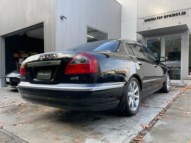 シーマ ３００Ｇグランドツーリング　ガラスサンルーフ　黒革内装　ターボ　ノーマル　８型純正ナビ　オットマン　Ｂカメラ　ＶＱ３０ＤＥＴ搭載２８０Ｐｓトルク３９．５Ｋｇｍ４．５Ｖ８ゴールドエンブレム　ＫＨ３純正ブラック　バルカンヘッドライト（2枚目）