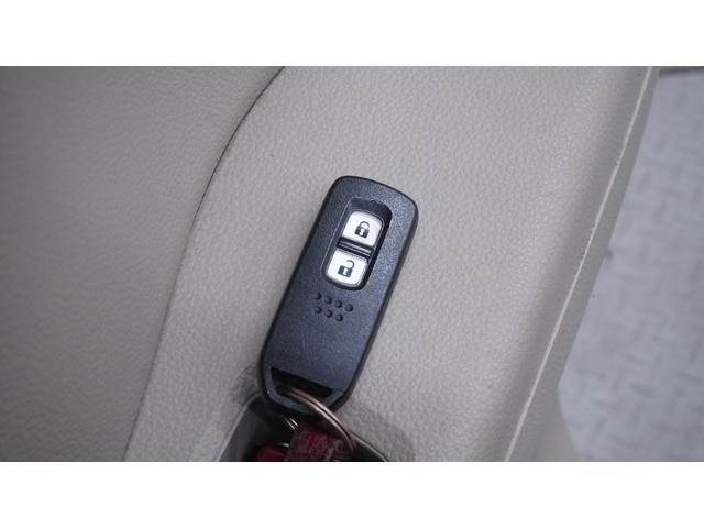 Ｎ－ＢＯＸ Ｇホンダセンシング　禁煙車　社外オーディオ　ホンダセンシング　アダプティブクルーズコントロール　ステアリングスイッチ　スマートキー　プッシュスタート　インパネＡＴ　ベンチシート　アームレスト　ＬＥＤヘッドライト（14枚目）