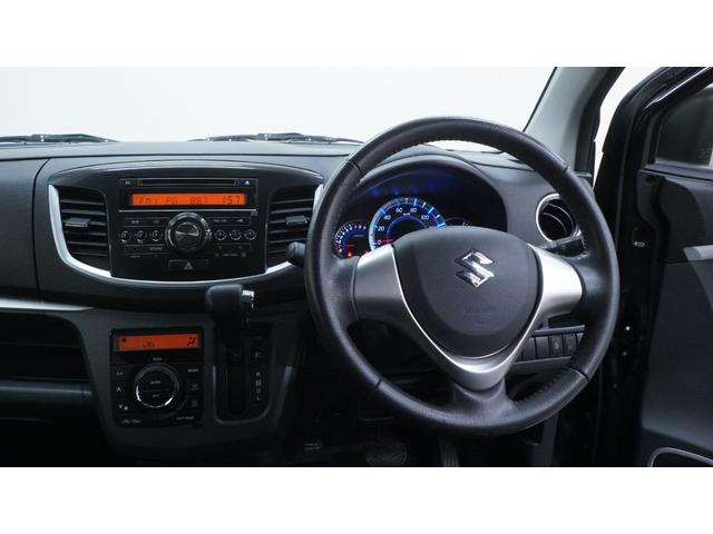 ワゴンＲスティングレー Ｘ　禁煙車　オーディオ　スマートキー　革巻きハンドル　アームレスト　チルトステアリング　シートリフター　ＨＩＤヘッドライト　ＡＵＴＯエアコン　電動格納ドアミラー　純正１４インチアルミホイール（3枚目）