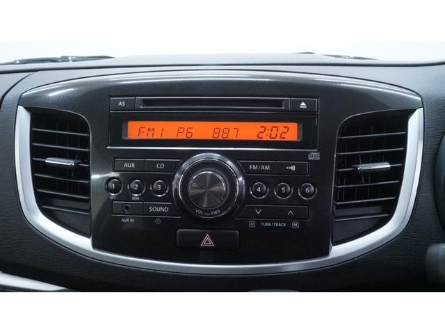 ワゴンＲスティングレー Ｘ　禁煙車　オーディオ　スマートキー　革巻きハンドル　アームレスト　チルトステアリング　シートリフター　ＨＩＤヘッドライト　ＡＵＴＯエアコン　電動格納ドアミラー　純正１４インチアルミホイール（9枚目）