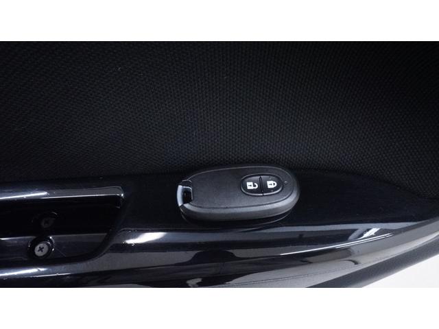 ワゴンＲスティングレー Ｘ　禁煙車　オーディオ　スマートキー　革巻きハンドル　アームレスト　チルトステアリング　シートリフター　ＨＩＤヘッドライト　ＡＵＴＯエアコン　電動格納ドアミラー　純正１４インチアルミホイール（14枚目）