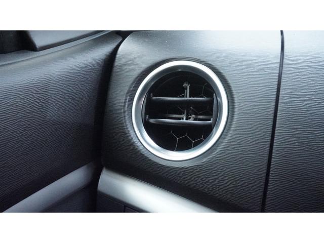 ワゴンＲスティングレー Ｘ　禁煙車　オーディオ　スマートキー　革巻きハンドル　アームレスト　チルトステアリング　シートリフター　ＨＩＤヘッドライト　ＡＵＴＯエアコン　電動格納ドアミラー　純正１４インチアルミホイール（30枚目）