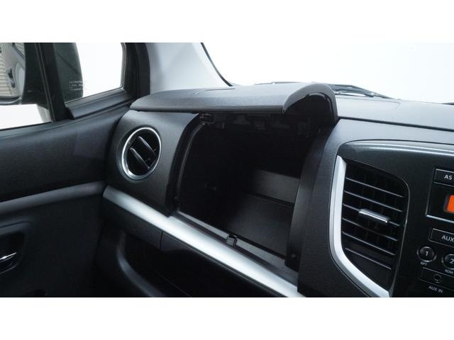 ワゴンＲスティングレー Ｘ　禁煙車　オーディオ　スマートキー　革巻きハンドル　アームレスト　チルトステアリング　シートリフター　ＨＩＤヘッドライト　ＡＵＴＯエアコン　電動格納ドアミラー　純正１４インチアルミホイール（32枚目）