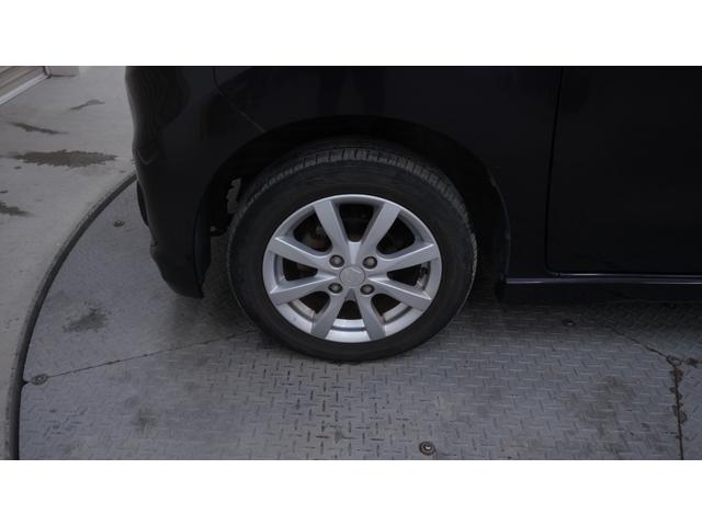 ワゴンＲスティングレー Ｘ　禁煙車　オーディオ　スマートキー　革巻きハンドル　アームレスト　チルトステアリング　シートリフター　ＨＩＤヘッドライト　ＡＵＴＯエアコン　電動格納ドアミラー　純正１４インチアルミホイール（55枚目）