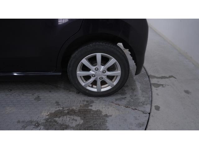 ワゴンＲスティングレー Ｘ　禁煙車　オーディオ　スマートキー　革巻きハンドル　アームレスト　チルトステアリング　シートリフター　ＨＩＤヘッドライト　ＡＵＴＯエアコン　電動格納ドアミラー　純正１４インチアルミホイール（56枚目）