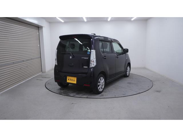 ワゴンＲスティングレー Ｘ　禁煙車　オーディオ　スマートキー　革巻きハンドル　アームレスト　チルトステアリング　シートリフター　ＨＩＤヘッドライト　ＡＵＴＯエアコン　電動格納ドアミラー　純正１４インチアルミホイール（57枚目）