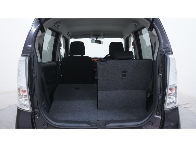 ワゴンＲスティングレー Ｘ　禁煙車　オーディオ　スマートキー　革巻きハンドル　アームレスト　チルトステアリング　シートリフター　ＨＩＤヘッドライト　ＡＵＴＯエアコン　電動格納ドアミラー　純正１４インチアルミホイール（66枚目）