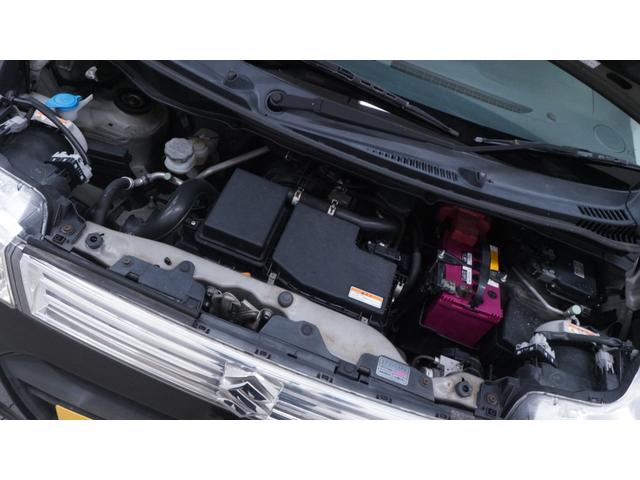 ワゴンＲスティングレー Ｘ　禁煙車　オーディオ　スマートキー　革巻きハンドル　アームレスト　チルトステアリング　シートリフター　ＨＩＤヘッドライト　ＡＵＴＯエアコン　電動格納ドアミラー　純正１４インチアルミホイール（68枚目）