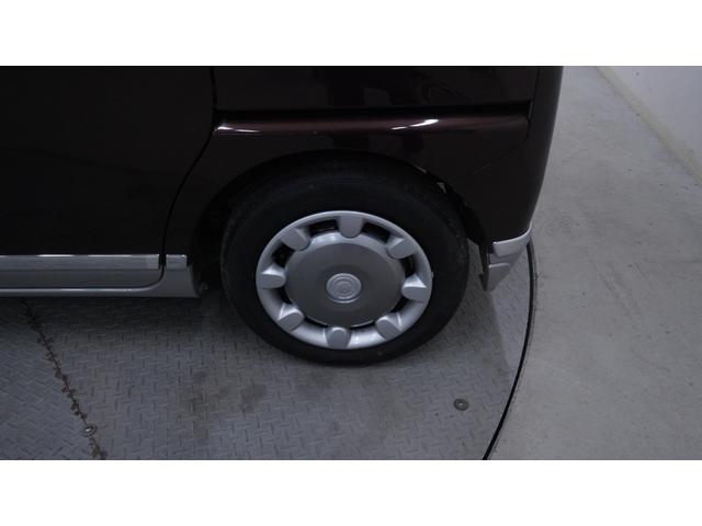 ムーヴキャンバス Ｇメイクアップ　ＳＡＩＩ　禁煙車　純正ナビ　フルセグＴＶ　Ｂｌｕｅｔｏｏｔｈ対応　ＣＤ／ＤＶＤ再生　両側パワースライドドア　革巻きハンドル　ＡＵＴＯエアコン　ステアリングスイッチ　電動格納ドアミラー　スマートキー（62枚目）