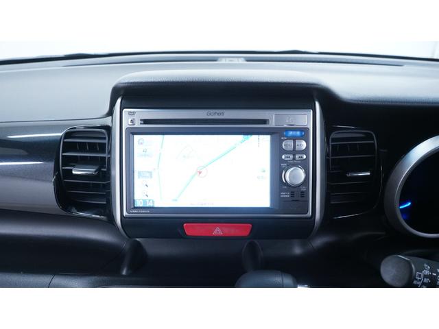 Ｎ－ＢＯＸ＋カスタム Ｇ・Ｌパッケージ　禁煙車　純正ナビ　地デジＴＶ　ＣＤ／ＤＶＤ再生　バックカメラ　パワースライドドア　スマートキー　アームレスト　ＨＩＤヘッドライト　　電動格納ドアミラーウィンカー　アイドリングストップ　ＥＴＣ（9枚目）