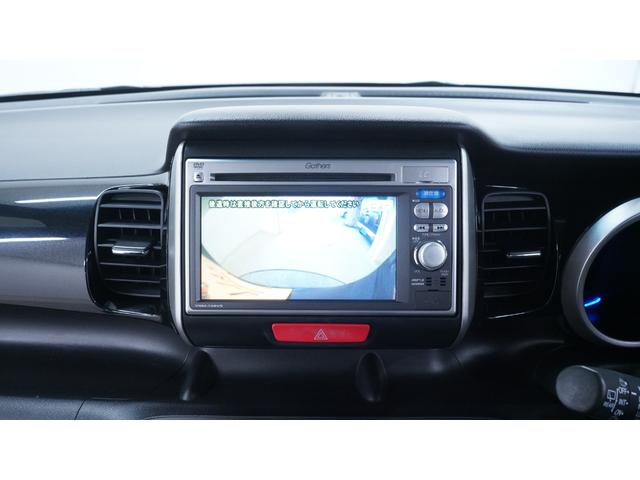 Ｎ－ＢＯＸ＋カスタム Ｇ・Ｌパッケージ　禁煙車　純正ナビ　地デジＴＶ　ＣＤ／ＤＶＤ再生　バックカメラ　パワースライドドア　スマートキー　アームレスト　ＨＩＤヘッドライト　　電動格納ドアミラーウィンカー　アイドリングストップ　ＥＴＣ（10枚目）