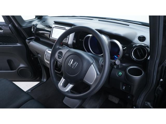 Ｎ－ＢＯＸ＋カスタム Ｇ・Ｌパッケージ　禁煙車　純正ナビ　地デジＴＶ　ＣＤ／ＤＶＤ再生　バックカメラ　パワースライドドア　スマートキー　アームレスト　ＨＩＤヘッドライト　　電動格納ドアミラーウィンカー　アイドリングストップ　ＥＴＣ（18枚目）