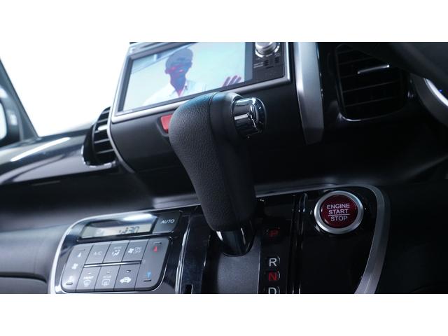 Ｎ－ＢＯＸ＋カスタム Ｇ・Ｌパッケージ　禁煙車　純正ナビ　地デジＴＶ　ＣＤ／ＤＶＤ再生　バックカメラ　パワースライドドア　スマートキー　アームレスト　ＨＩＤヘッドライト　　電動格納ドアミラーウィンカー　アイドリングストップ　ＥＴＣ（28枚目）