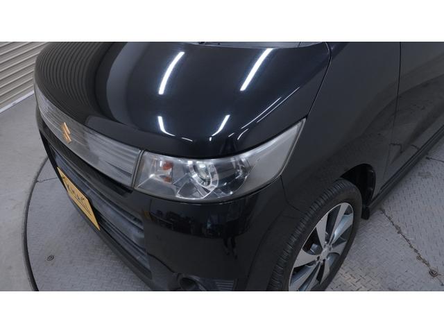 ワゴンＲスティングレー リミテッドＩＩ　禁煙車　スマートキー　プッシュスタート　インパネＡＴ　ベンチシート　アームレスト　ＨＩＤヘッドライト　革巻きハンドル　　シートヒーター　助手席下収納　電動格納ドアミラー　純正１５インチアルミホイール（55枚目）