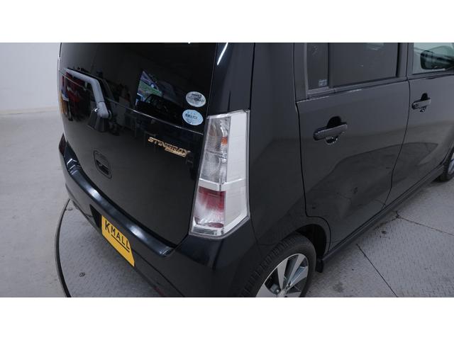 ワゴンＲスティングレー リミテッドＩＩ　禁煙車　スマートキー　プッシュスタート　インパネＡＴ　ベンチシート　アームレスト　ＨＩＤヘッドライト　革巻きハンドル　　シートヒーター　助手席下収納　電動格納ドアミラー　純正１５インチアルミホイール（62枚目）