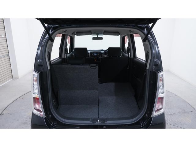 ワゴンＲスティングレー リミテッドＩＩ　禁煙車　スマートキー　プッシュスタート　インパネＡＴ　ベンチシート　アームレスト　ＨＩＤヘッドライト　革巻きハンドル　　シートヒーター　助手席下収納　電動格納ドアミラー　純正１５インチアルミホイール（69枚目）