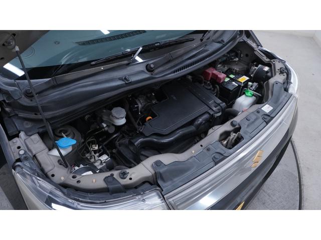 ワゴンＲスティングレー リミテッドＩＩ　禁煙車　スマートキー　プッシュスタート　インパネＡＴ　ベンチシート　アームレスト　ＨＩＤヘッドライト　革巻きハンドル　　シートヒーター　助手席下収納　電動格納ドアミラー　純正１５インチアルミホイール（71枚目）