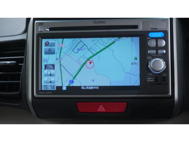 Ｎ－ＢＯＸ Ｇ・Ｌパッケージ　禁煙車　ナビ装着車スペシャルパッケージ　純正ナビ　地デジＴＶ　ＣＤ／ＤＶＤ再生　バックカメラ　パワースライドドア　スマートキー　ＡＵＴＯライト　電動格納ドアミラー　アイドリングストップ（9枚目）