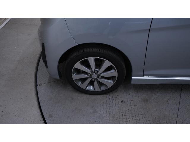 ｅＫカスタム Ｔ　禁煙車　社外ナビ　フルセグＴＶ　ＣＤ／ＤＶＤ　バックモニター　ＨＩＤヘッドライト　ＡＵＴＯライト　スマートキー　プッシュスタート　アームレスト　純正１５インチアルミホイール　革巻きハンドル　ＥＴＣ（58枚目）