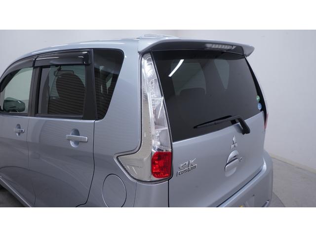 ｅＫカスタム Ｔ　禁煙車　社外ナビ　フルセグＴＶ　ＣＤ／ＤＶＤ　バックモニター　ＨＩＤヘッドライト　ＡＵＴＯライト　スマートキー　プッシュスタート　アームレスト　純正１５インチアルミホイール　革巻きハンドル　ＥＴＣ（63枚目）