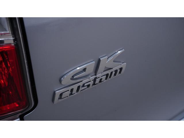 ｅＫカスタム Ｔ　禁煙車　社外ナビ　フルセグＴＶ　ＣＤ／ＤＶＤ　バックモニター　ＨＩＤヘッドライト　ＡＵＴＯライト　スマートキー　プッシュスタート　アームレスト　純正１５インチアルミホイール　革巻きハンドル　ＥＴＣ（67枚目）