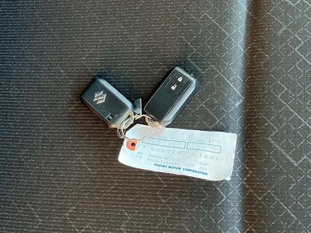 ワゴンR FX 禁煙車 CDプレーヤー装着車 デュアルカメラブレーキサポート 後退時ブレーキサポート オートライトシステム キーレスエントリーシステム 運転席シートヒーター フルオートエアコン アンブレラホルダー(4枚目)