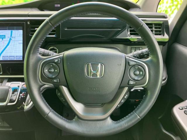 ステップワゴンスパーダ eHEVスパーダG・EXホンダセンシング 保証書/純正 SDナビ/フリップダウンモニター 純正 11.6インチ/ホンダセンシング/両側電動スライドドア/シートヒーター 前席/車線逸脱防止支援システム/シート ハーフレザー 衝突被害軽減システム(16枚目)