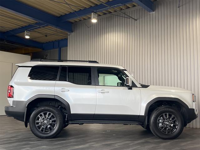 ランドクルーザー２５０ ＶＸ　１年保証付・禁煙車・１オーナー・トヨタチームメイト・丸目ＬＥＤオートライト・ムーンルーフ・ナビ・Ｂｌｕｅｔｏｏｔｈ・パノラミックビューモニター・トヨタセーフティ・クルーズコントロール・黒レザーシート（27枚目）