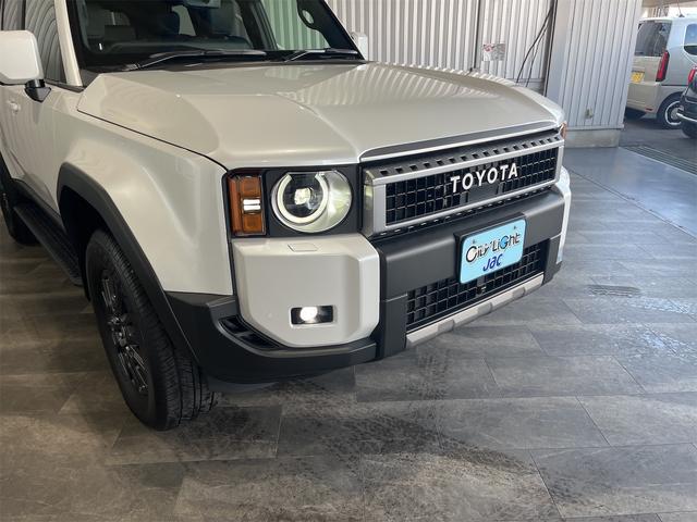 ランドクルーザー２５０ ＶＸ　１年保証付・禁煙車・１オーナー・トヨタチームメイト・丸目ＬＥＤオートライト・ムーンルーフ・ナビ・Ｂｌｕｅｔｏｏｔｈ・パノラミックビューモニター・トヨタセーフティ・クルーズコントロール・黒レザーシート（34枚目）