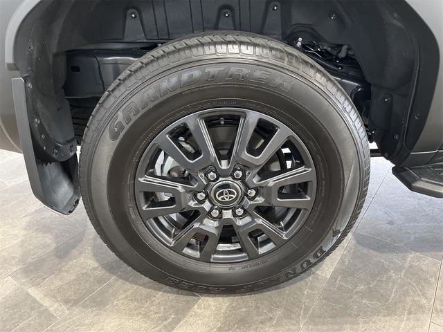 ランドクルーザー２５０ ＶＸ　１年保証付・禁煙車・１オーナー・トヨタチームメイト・丸目ＬＥＤオートライト・ムーンルーフ・ナビ・Ｂｌｕｅｔｏｏｔｈ・パノラミックビューモニター・トヨタセーフティ・クルーズコントロール・黒レザーシート（57枚目）