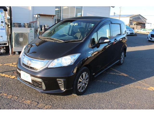 フリードハイブリッド ジャストセレクション　フルセグナビ　バックカメラ　左右パワースライドドア　スマートキー二個　オートライトＨＩＤ　ＥＴＣ　純正アルミ（2枚目）