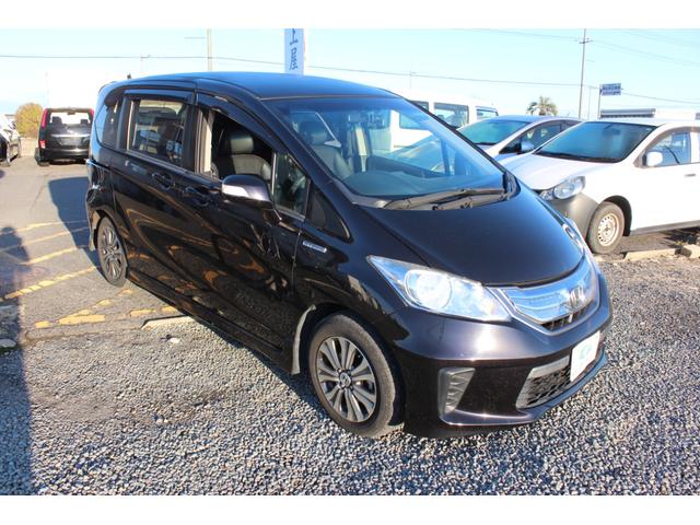 フリードハイブリッド ジャストセレクション　フルセグナビ　バックカメラ　左右パワースライドドア　スマートキー二個　オートライトＨＩＤ　ＥＴＣ　純正アルミ（5枚目）